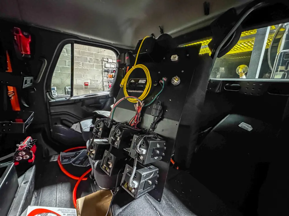 Cab interior upfit with exposed console area, photo 46 of 303.